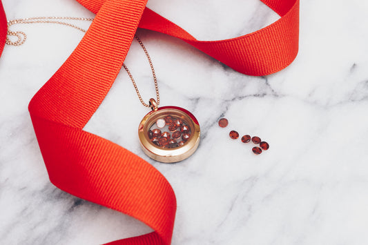 Rose gold garnet locket necklace