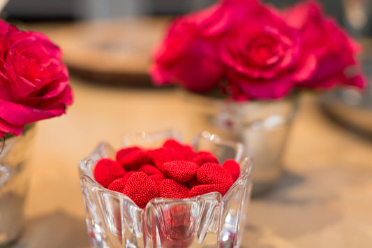 red valentines day heart candies and red roses