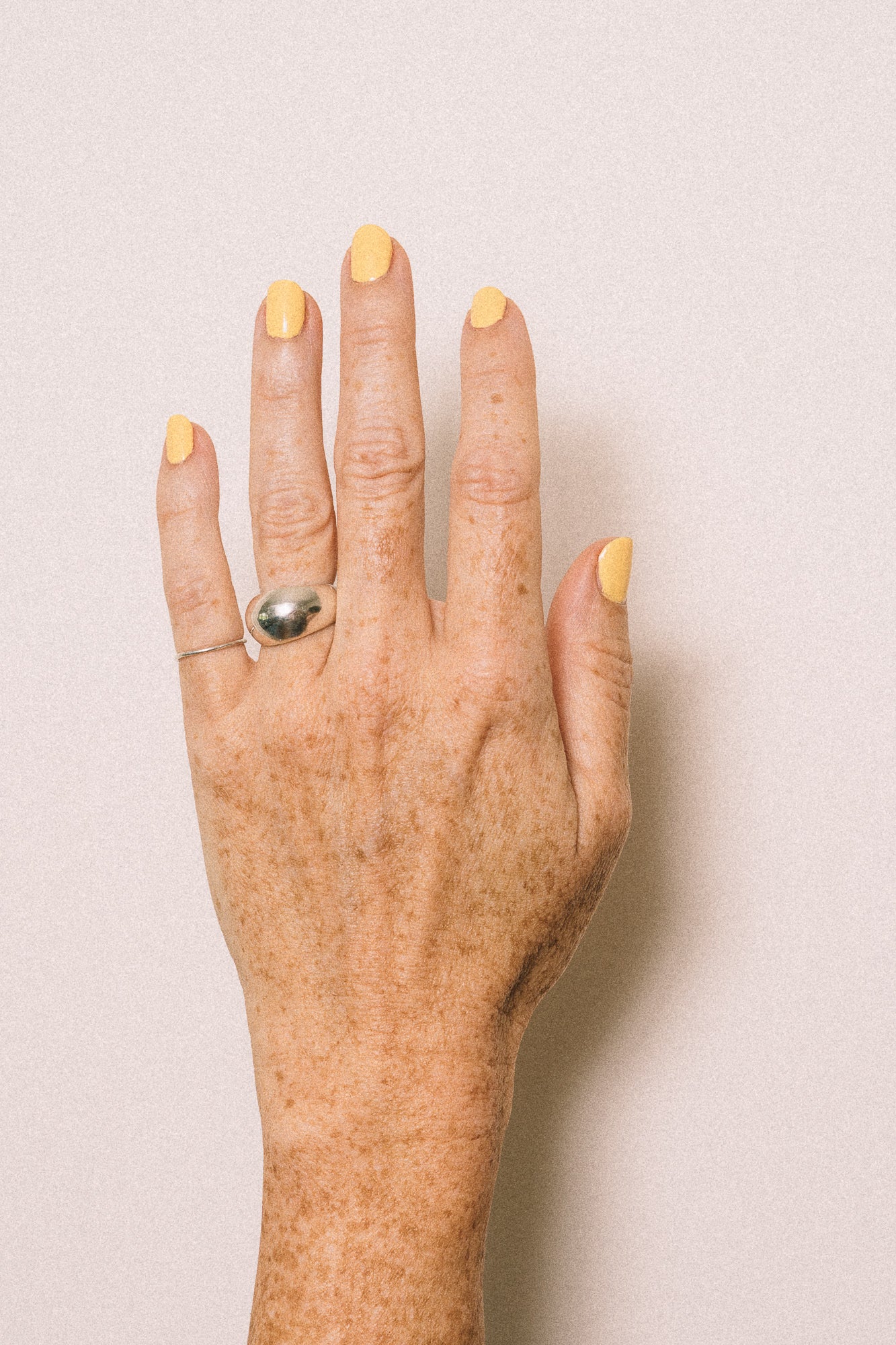 silver dome ring on model hand