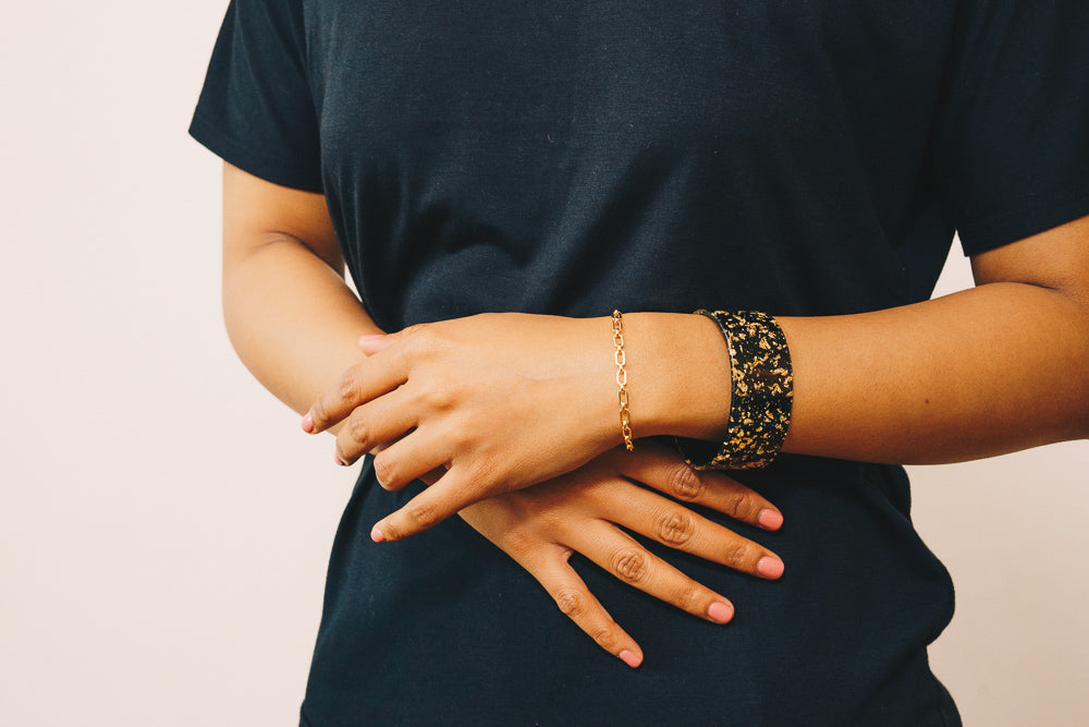 vintage chain link bracelet on arm with acrylic cuff bracelet 