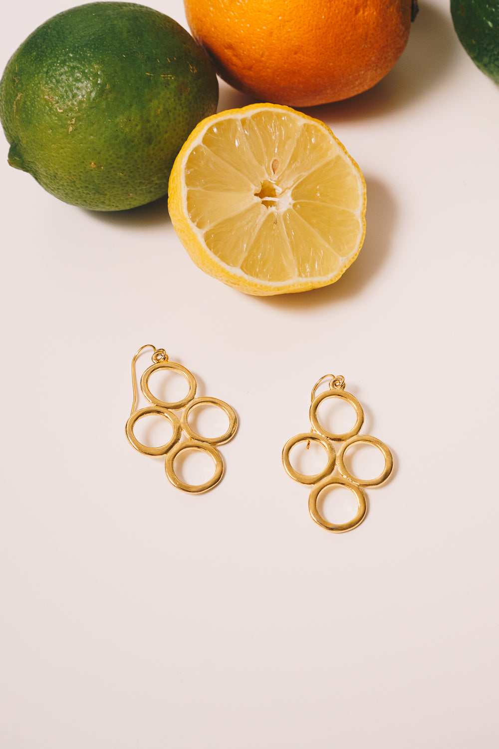 gold circle drop earrings