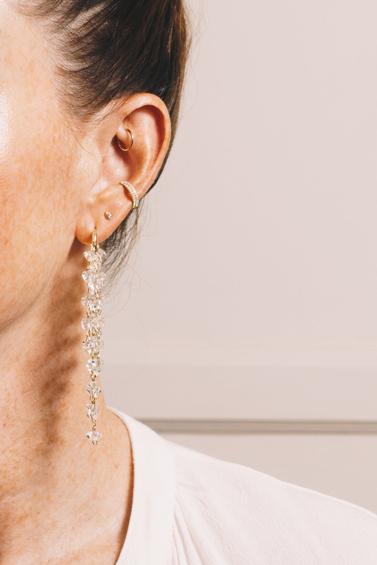 crystal statement earrings on model front view closeupup