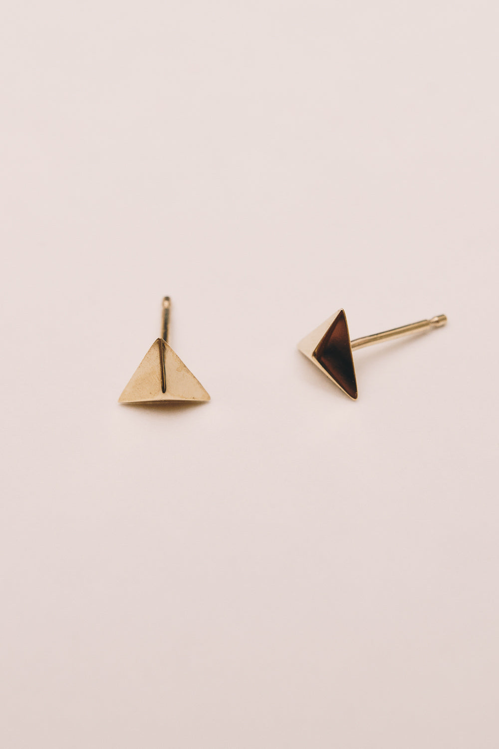 14k gold pyramid studs closeup