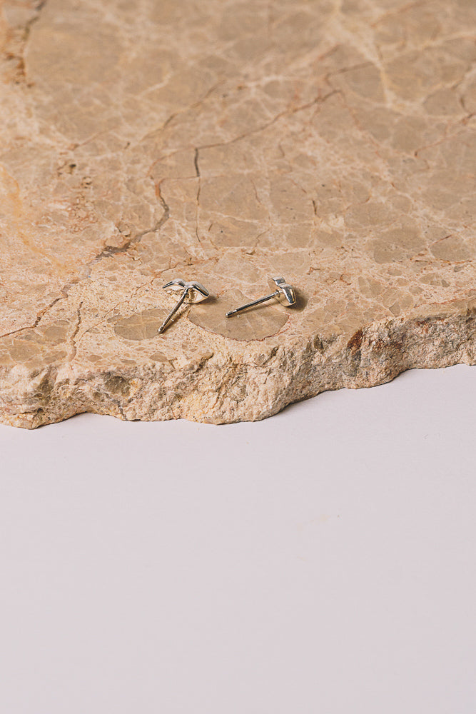 silver lip studs back view