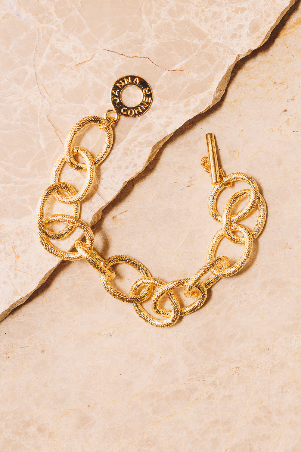 gold link chain bracelet toggle clasp above view