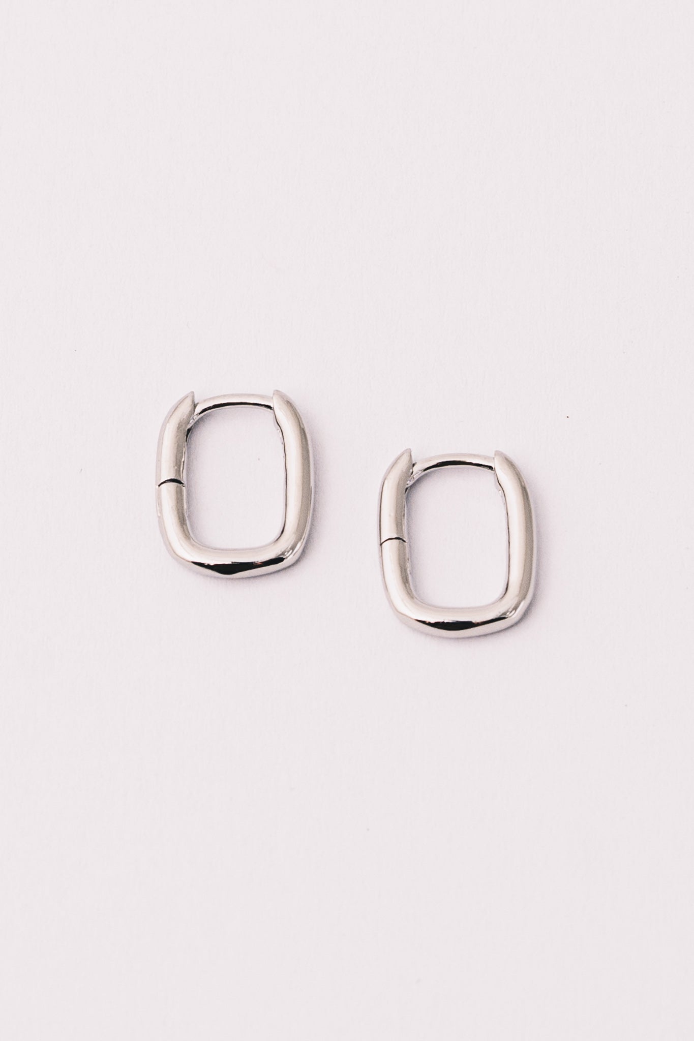 silver rectangular huggie hoops