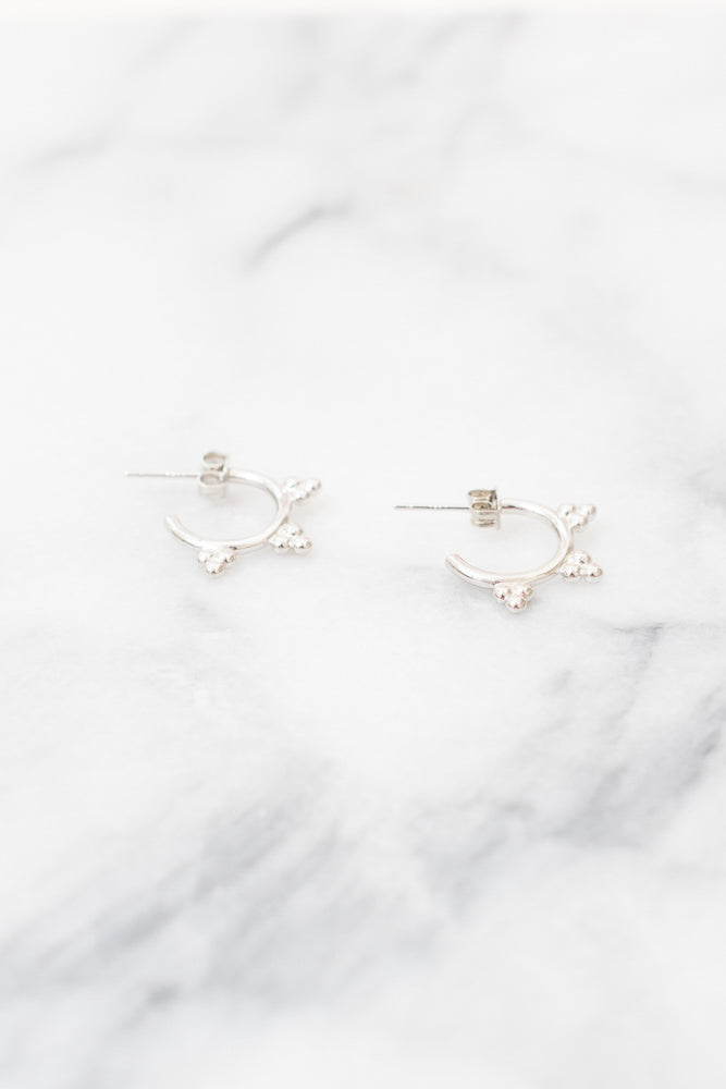 silver hoop earrings with ball accents
