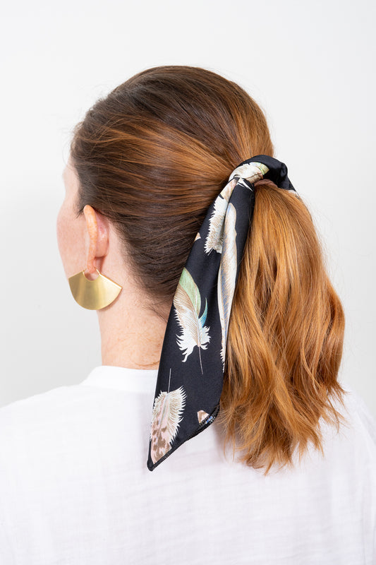 red head girl ponytail with black scarf tie gold fan earrings spring accessories trend 2019