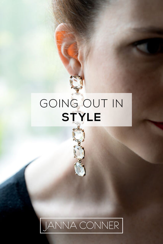 janna conner going out in style woman back lit silhouette with shoulder length dangle earrings
