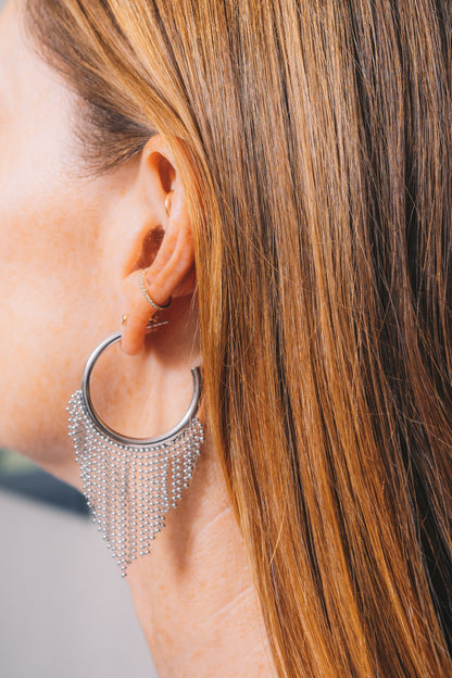 silver hoop chain fringe earrings on red haired model side view