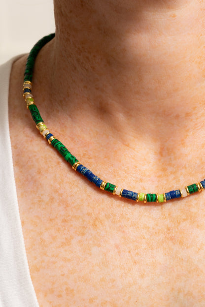 green and blue rondelle necklace on model closeup