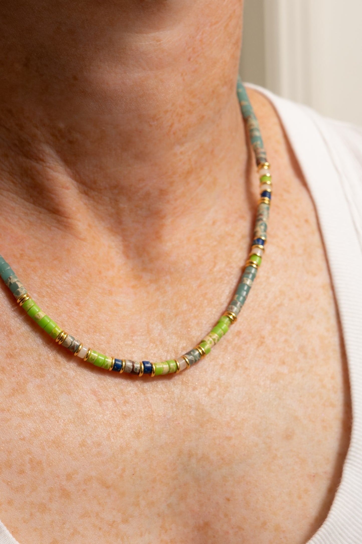turquoise and green beaded summer necklace on model