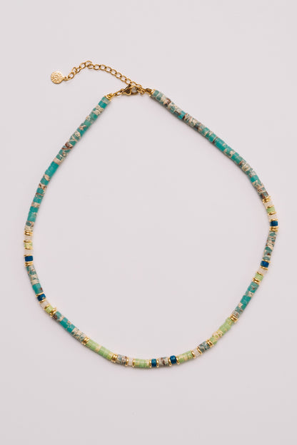 turquoise and green summer beaded necklace on white background