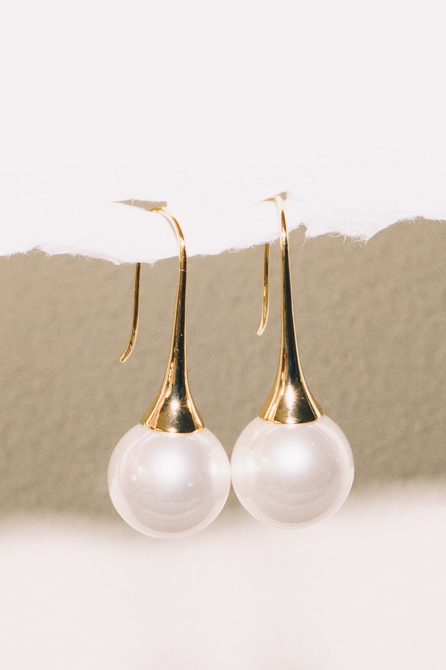 pearl drop earrings wedding on white background 