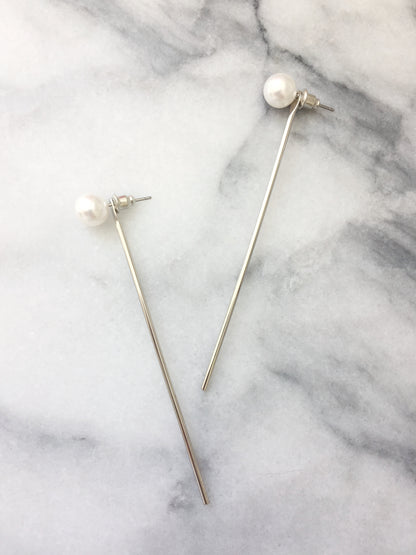 pearl and silver ear jacket stick earrings