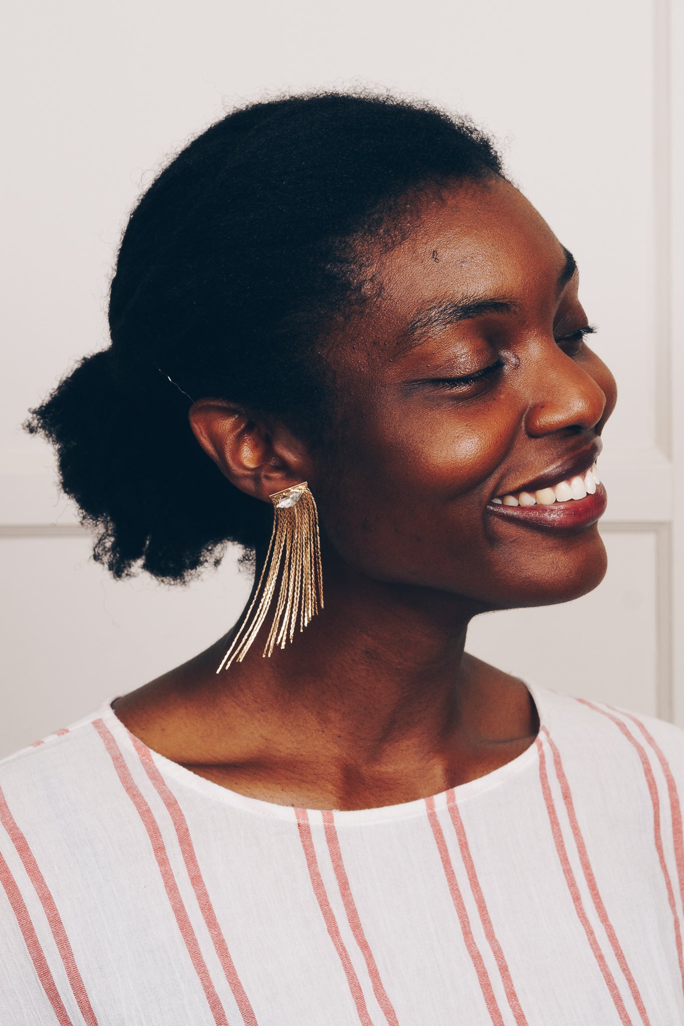 fringe earrings on model