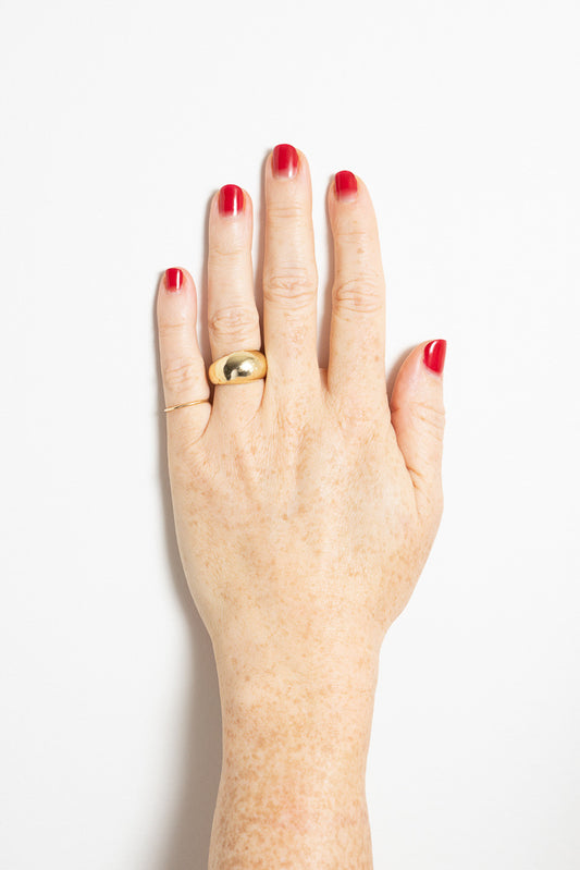 gold dome ring on model hand