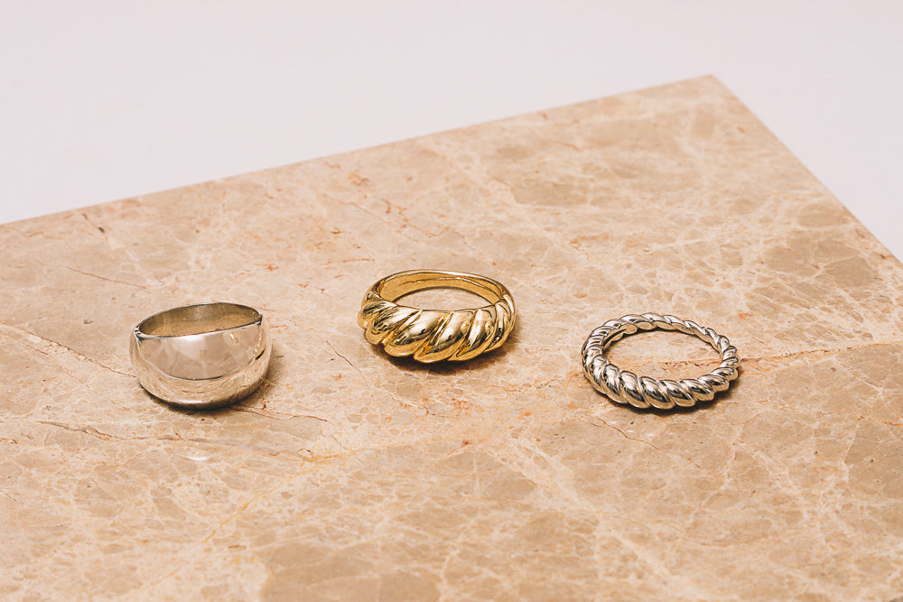 silver and gold statement rings