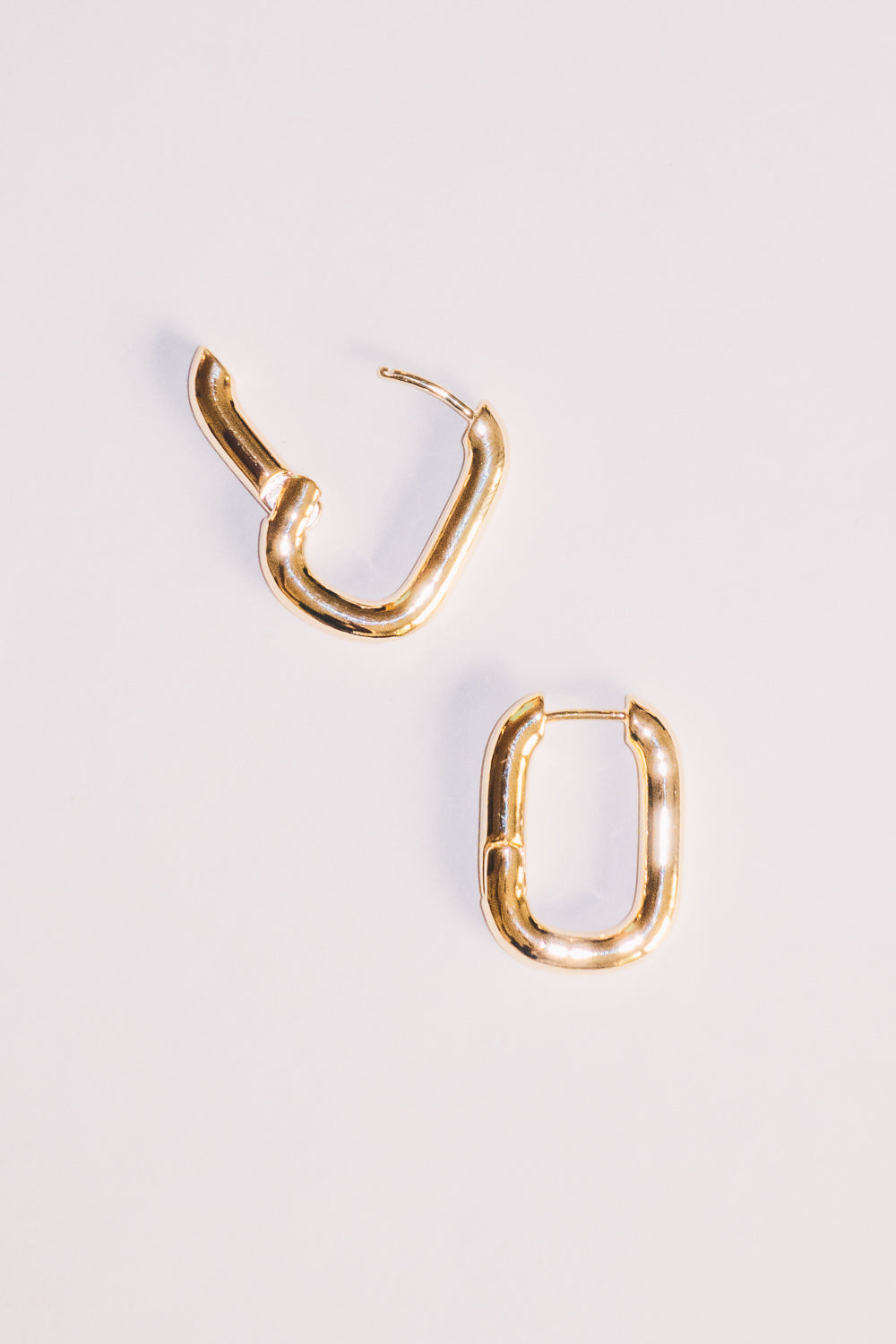 gold huggie hoop earrings with opening