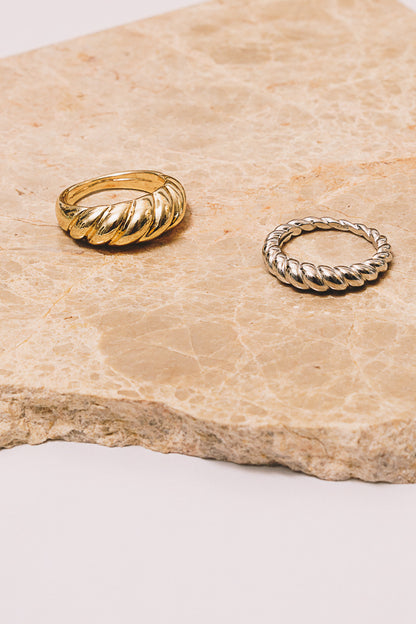 gold and silver rope rings
