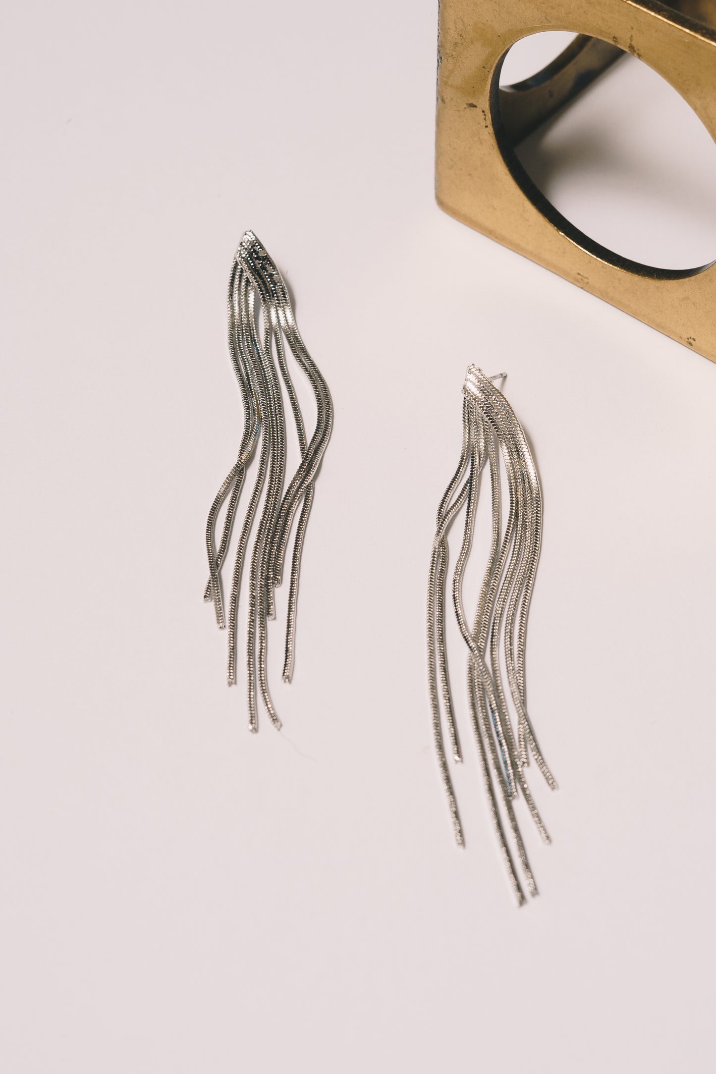 silver chain fringe statement earrings