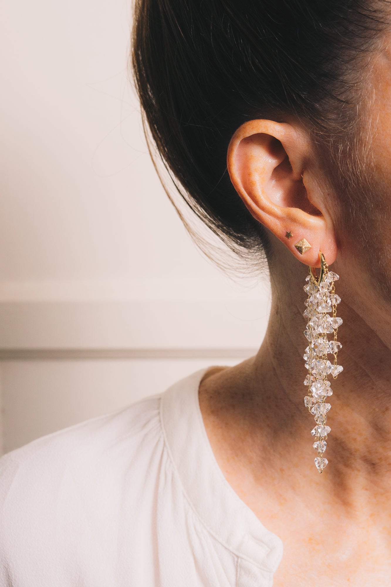 crystal waterfall earrings on model