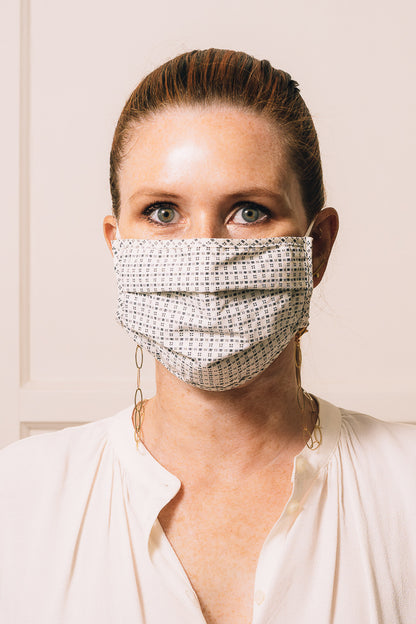 gold chain mask holder on model