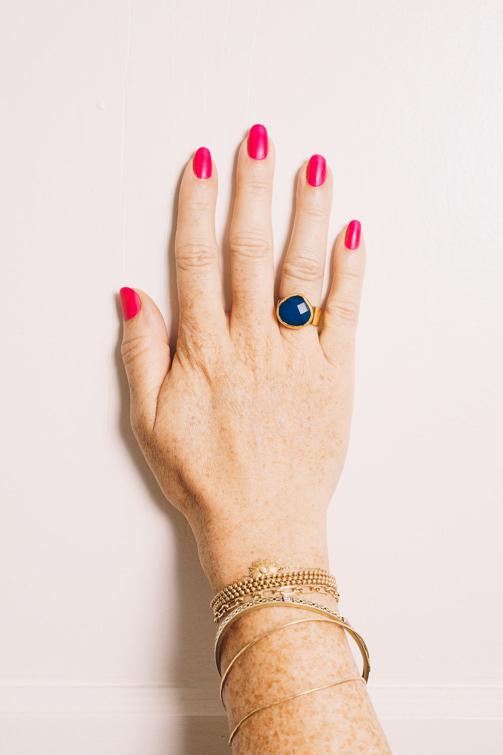 cobalt blue ring on hand