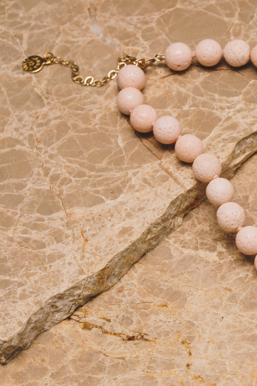 sponge coral beaded necklace closeup with necklace extender and clasp