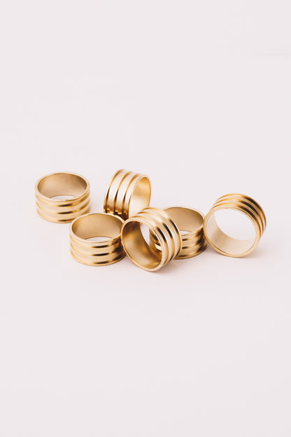 gold band rings in a group