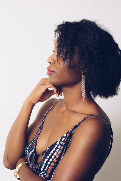 pearl fringe hoop earrings on model