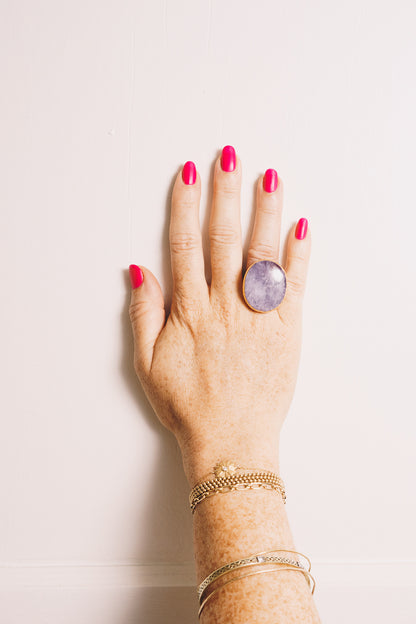 amethyst cocktail ring on hand