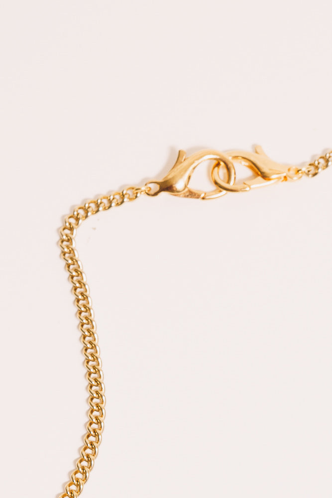 gold lobster clasp close up
