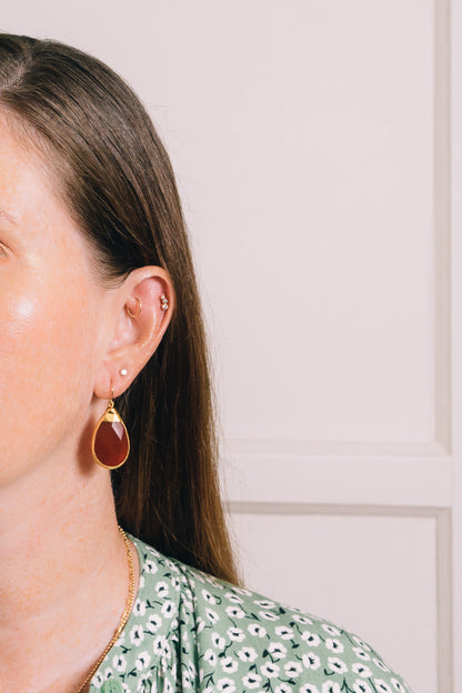 carnelian teardrop earrings on model