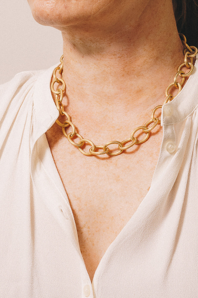 large gold rope chain necklace on model