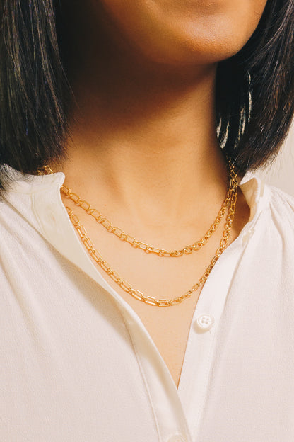 vintage chain link necklaces on model closeup