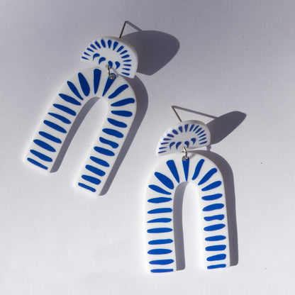 blue and white acrylic earrings