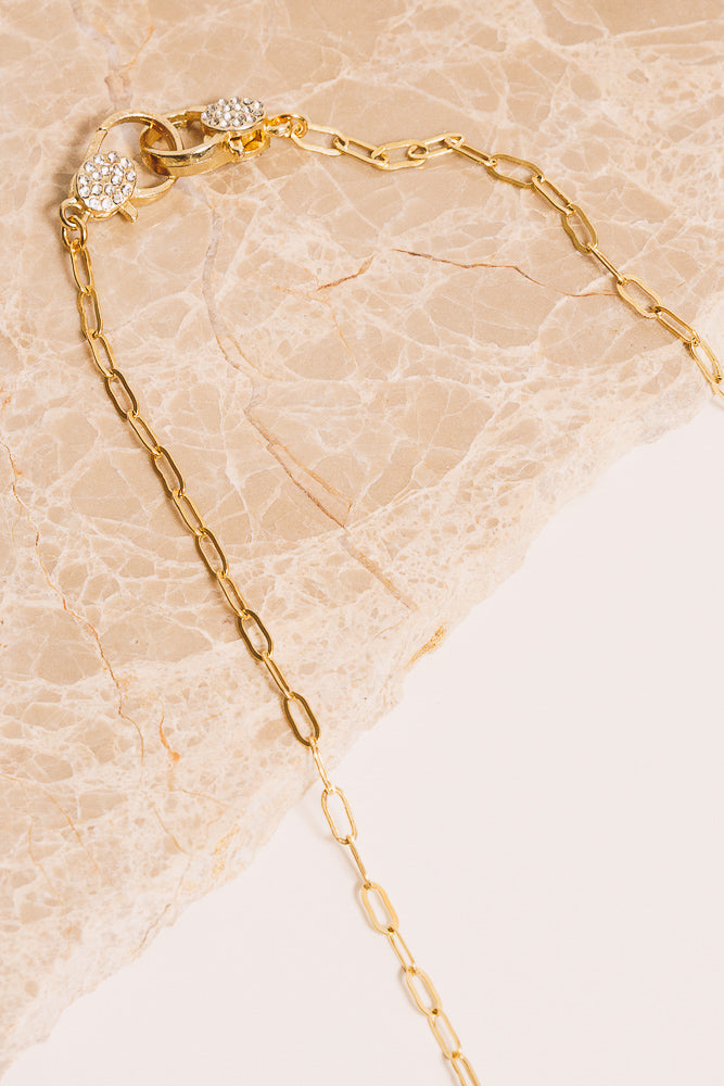gold chain necklace closeup