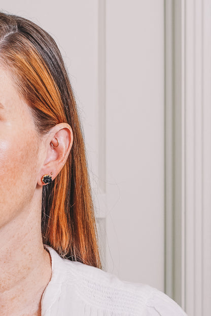 onyx rosette stud earrings on model