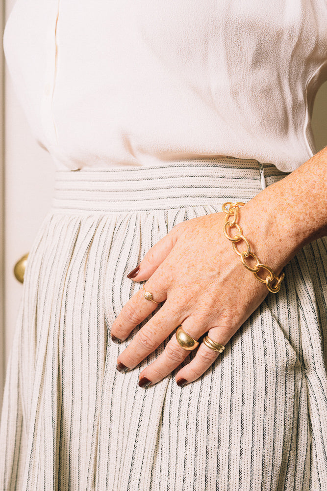 gold large link chain bracelet on model