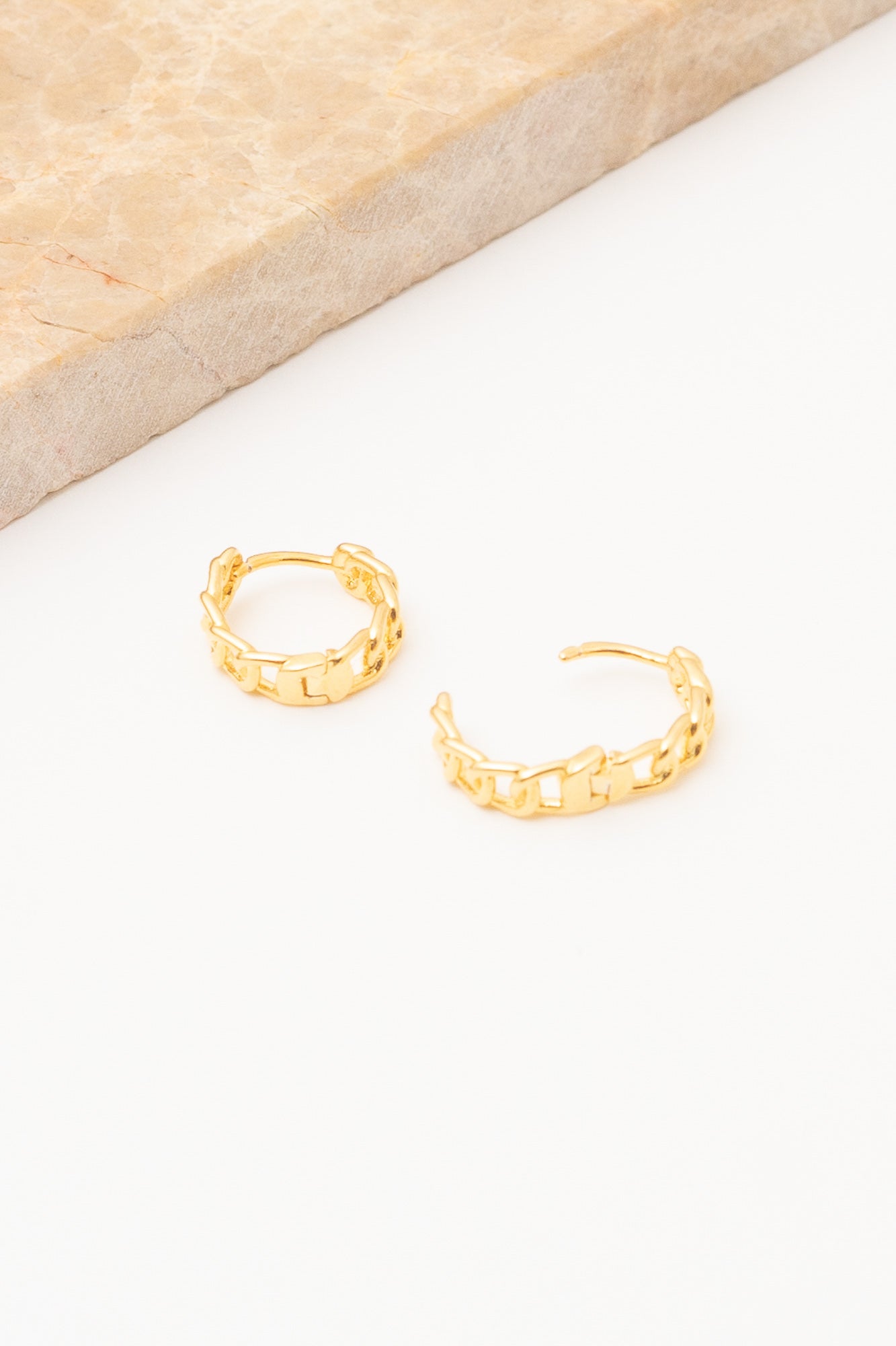 gold chain link huggie hoop earrings open