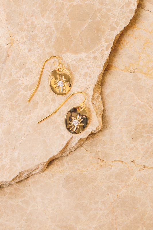 gold starburst earrings 