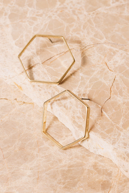 large gold hexagon stud earrings side view