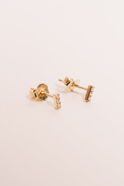 14k gold diamond bar earrings standing up