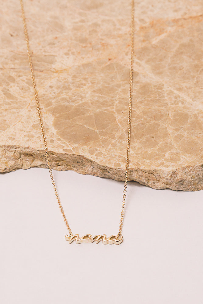 14k gold nana script necklace side view