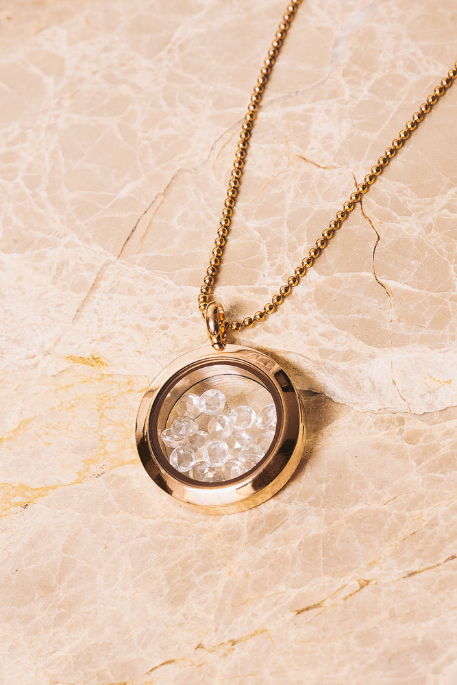 rose gold shaker locket with rose cut white topaz