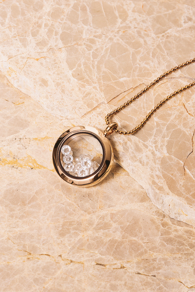 rose gold shaker locket with rose cut white topaz