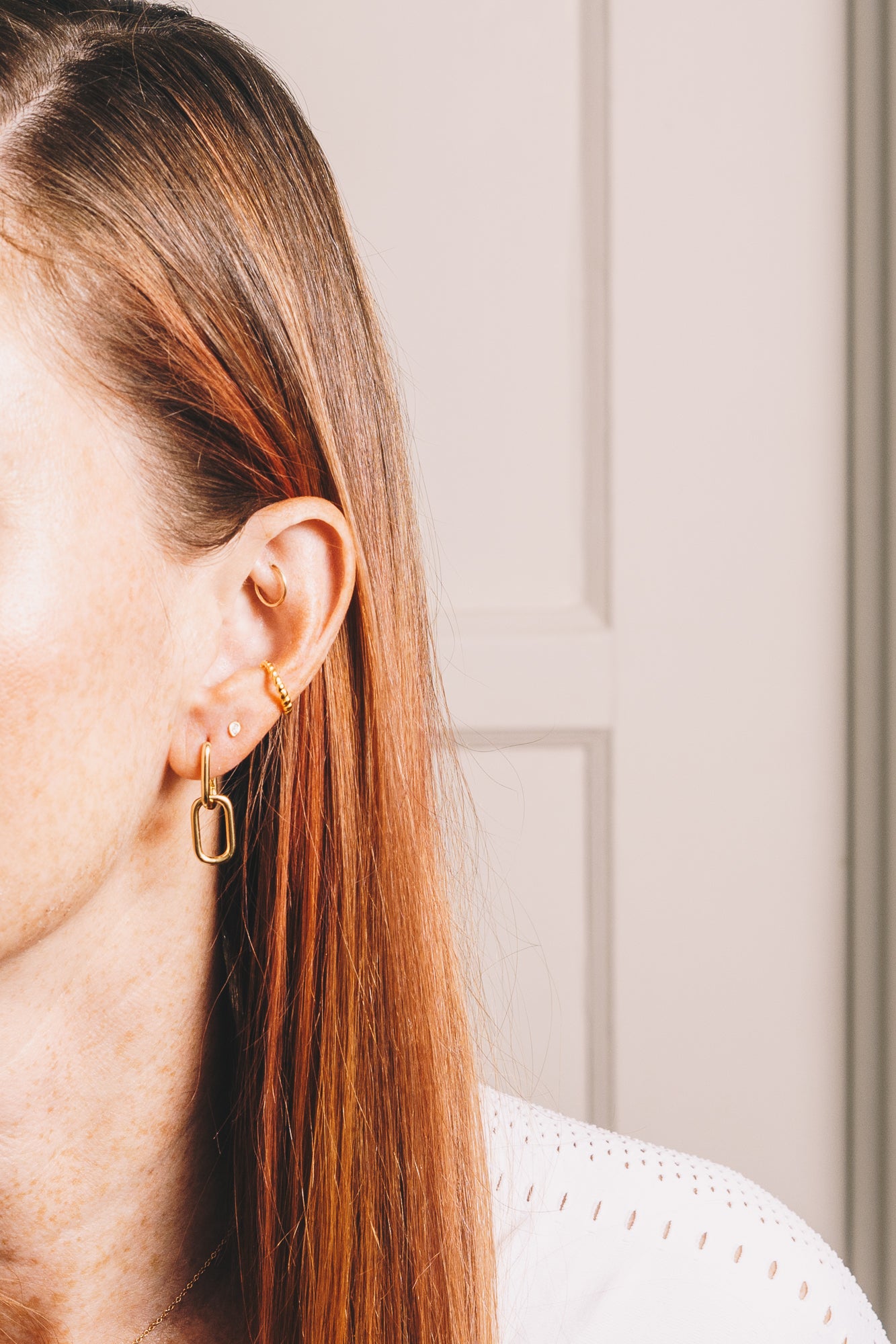 rectangular hoop earrings on model