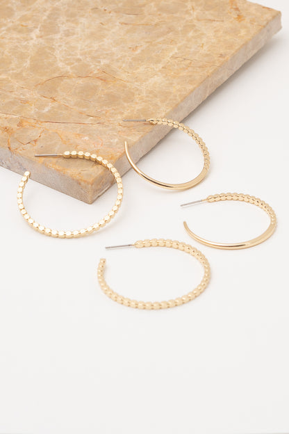 gold beaded hoops in different sizes
