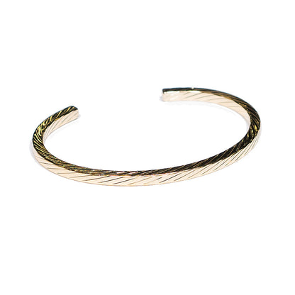 gold braided cuff bracelet